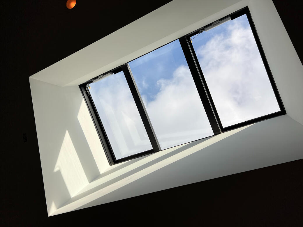 Skylight framed in a white ceiling well