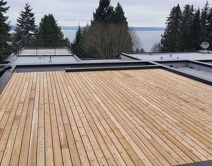 Cedar deck built by Luna Park Construction with a Puget Sound view in West Seattle